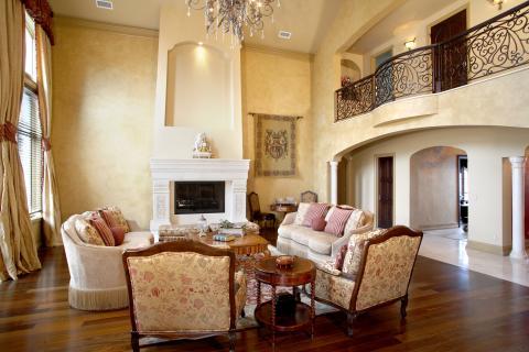 Traditional Living Room with white stone fire place mantel