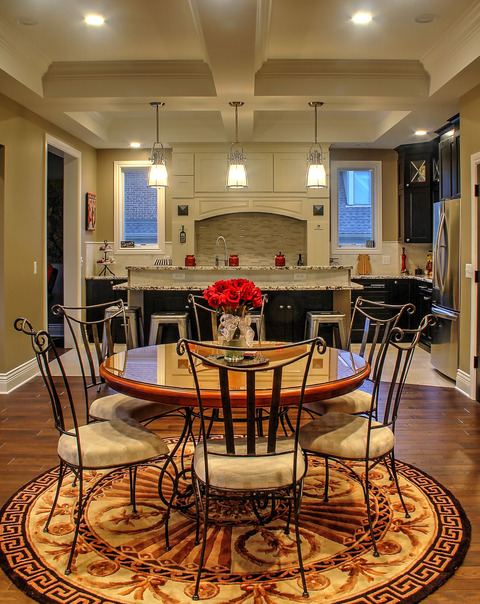 Transitional Dining Room with stainless steel appliances