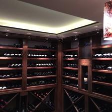 Contemporary Wine Cellar with red brushed nickel pendant lighting