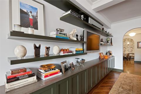 Contemporary Family Room with grey painted storage cabinets