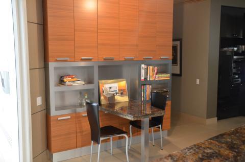 Contemporary Home Office with custom stainless steel shelving