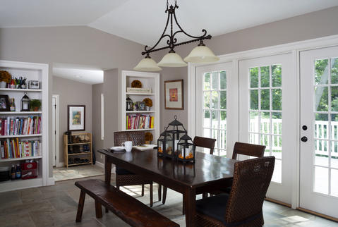 Transitional Dining Room with farmhouse dining table