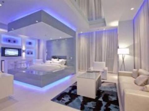 Contemporary Bedroom with white tile flooring
