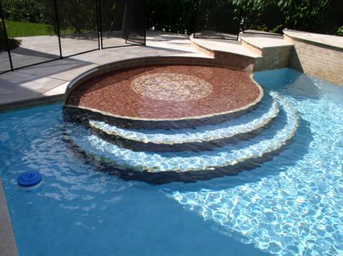 Transitional Pool with rounded tile steps in pool
