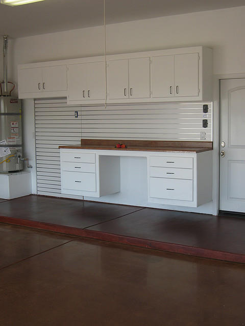 Contemporary Garage with acid stained concrete floor