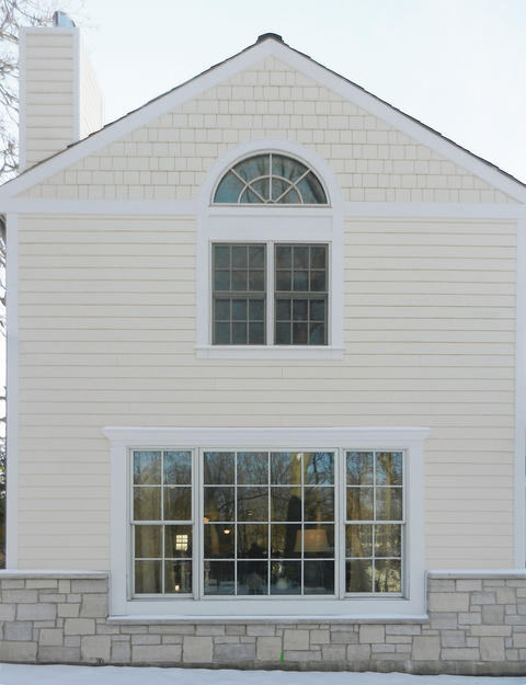 Colonial Home Exterior with large living room window
