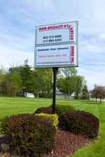 Door Specialty Overhead Doors, Inc. logo