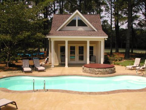 Traditional Pool with white framed window sand doors