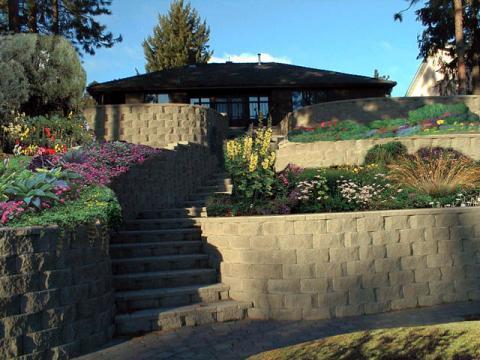 Transitional Landscape with concrete block retaining wall