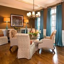 Eclectic Dining Room with upholstered mismatched dining chairs
