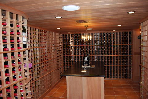 Contemporary Wine Cellar with wood paneled ceiling
