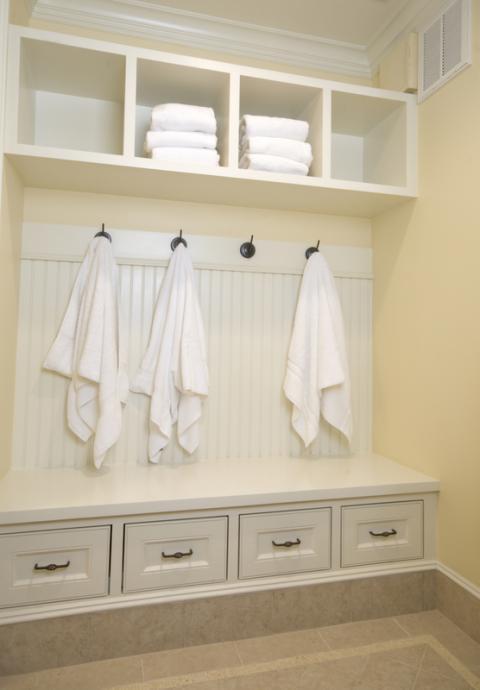 Traditional Closet with wainscoting wood wall paneling