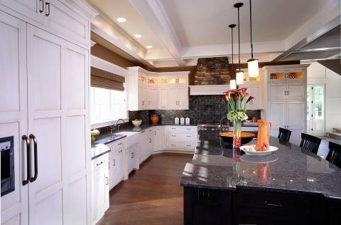 Transitional Kitchen with large kitchen island with black cabinets