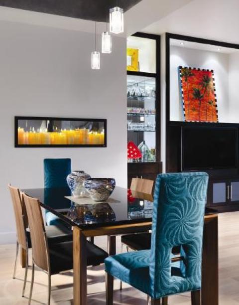 Eclectic Dining Room with bright blue swirl patterned dining chairs with high backs