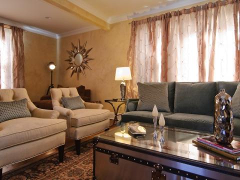 Transitional Living Room with teal velvet upholstered sofa