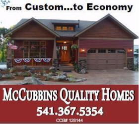 McCubbins Quality Homes logo