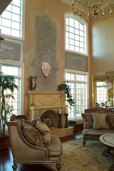 French Living Room with off white fire place facing and hearth
