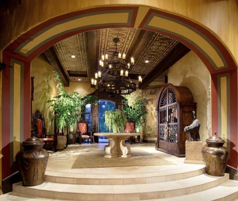 Mediterranean Entry with large old world style chandelier