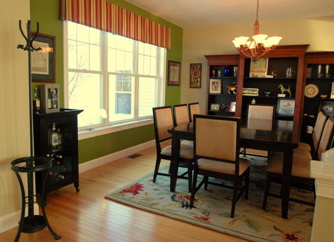 Eclectic Dining Room with china hutch with open shelving