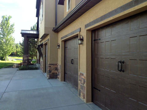Transitional Garage with recessed panel garage door