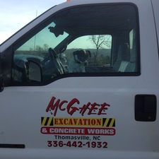 McGhee Excavation and Concrete Works logo
