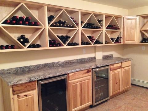 Contemporary Wine Cellar with recessed panel pine cabinet