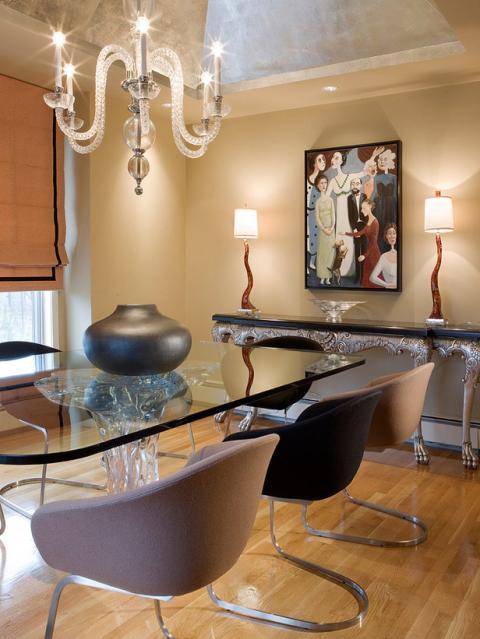 Eclectic Dining Room with elegant claw foot hallway table with silver legs and black surface