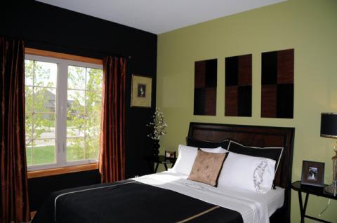 Contemporary Bedroom with black wood side tables