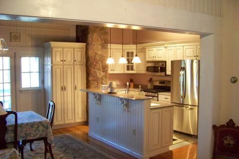 Traditional Kitchen with cherry wood dining furniture