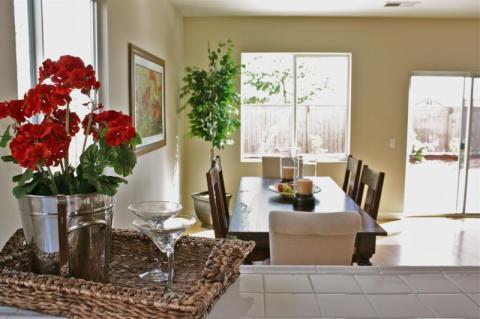 Transitional Dining Room with bypass sliding glass patio doors