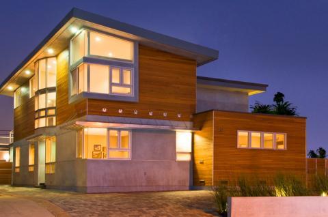 Modern Home Exterior with dark wood gray window trims