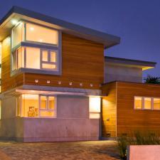 Modern Home Exterior with dark wood gray window trims