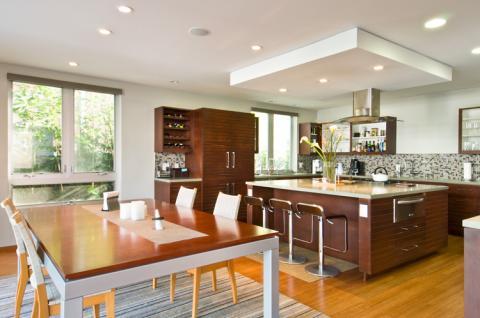Modern Kitchen with small brown and tan tile back splash