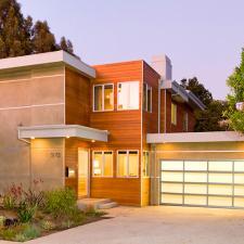 Modern Home Exterior with silver metal window and door frames