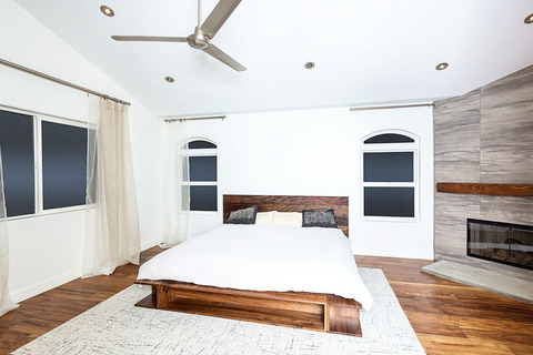 Contemporary Bedroom with stainless steel ceiling fan