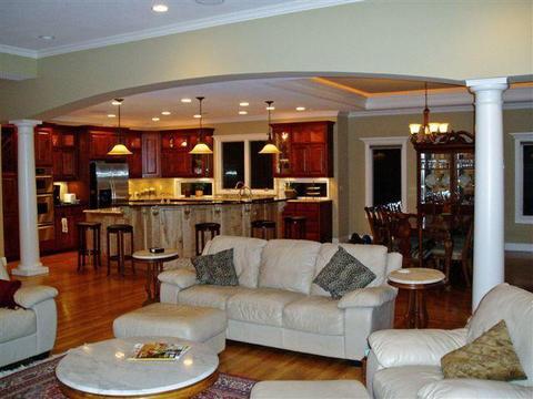Traditional Family Room with stainless steel kitchen appliances