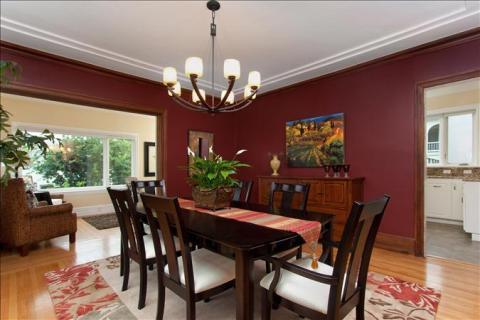 Transitional Dining Room with dark wood dining table and chairs