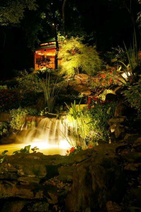 Transitional Landscape with man made pond with lights