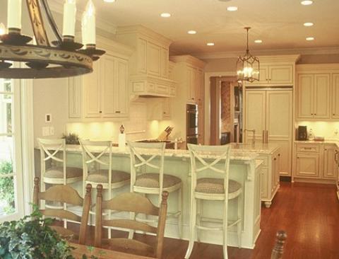 Traditional Kitchen with french country dining table