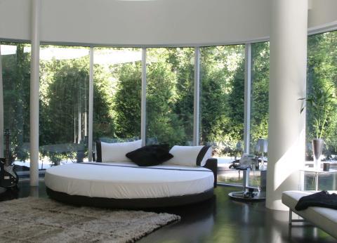 Modern Bedroom with floor to ceiling windows