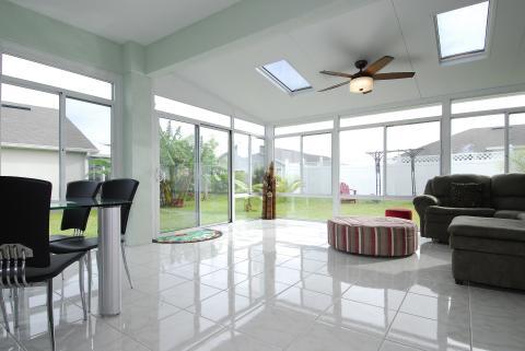 Contemporary Family Room with bypass sliding glass doors