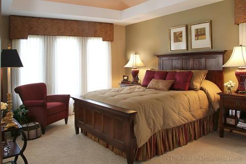 Traditional Bedroom with wooden head board and foot board