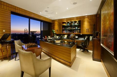 Contemporary Home Office with leather executive office chair on wheels