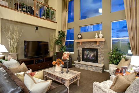 Transitional Family Room with brown leather recliner chair