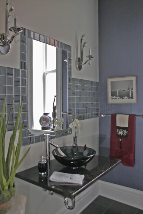 Eclectic Bathroom with wall mounted granite counter