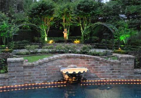 Transitional Landscape with wrought iron garden arch