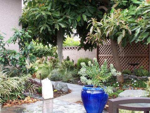 Transitional Landscape with large blue outdoor planter
