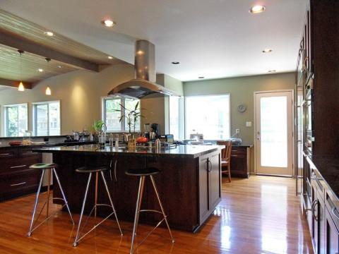 Modern Kitchen with black and steel bar stools