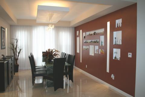 Modern Dining Room with unique display shelves built into wall