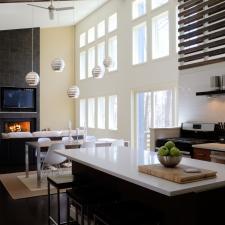 Contemporary Family Room with white glossy tile back splash accent wall